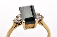 Lot 757 - A green tourmaline and diamond ring, the...