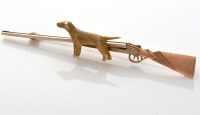 Lot 808 - A 9ct. yellow, white and rose gold sporting...
