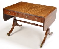 Lot 1259 - A Regency mahogany sofa table, the top with...