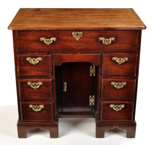 Lot 1045 - A fine early George III mahogany secretaire...
