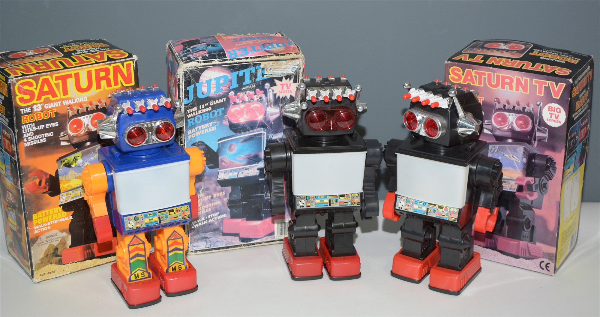 Lot 1020 - Two Saturn TV Robots and a Jupiter Robot