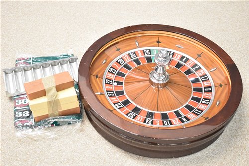 Lot 109 - John Huxley roulette wheel, chips, stand and mat