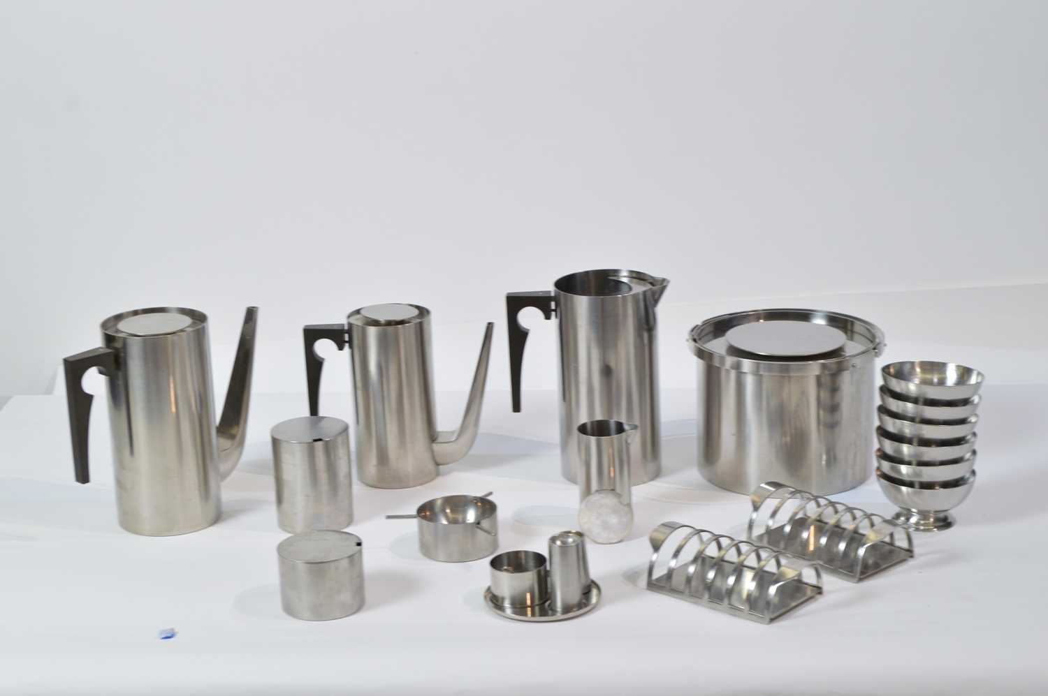 Lot 27 - Arne Jacobsen for Stelton: eleven pieces of 'Cylinda-line' tableware; and six dessert dishes.