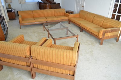 Lot 127 - A 1960's teak and Harris Tweed modular lounge suite.