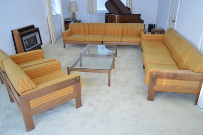 Lot 127 - A 1960's teak and Harris Tweed modular lounge suite.
