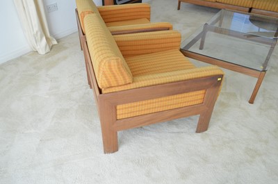Lot 127 - A 1960's teak and Harris Tweed modular lounge suite.