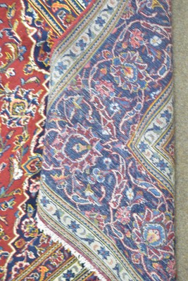 Lot 635 - A Kashan carpet.