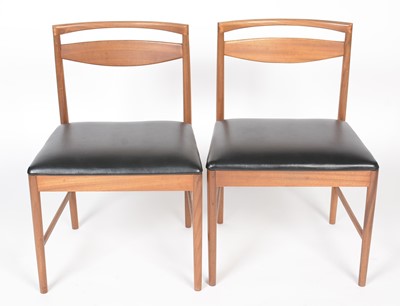 Lot 385 - A. H. McIntosh & Co. Ltd, Kirkcaldy: a mid Century teak extending dining table and six chairs.