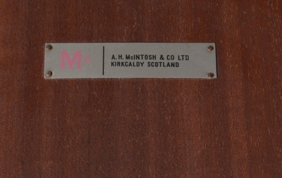 Lot 385 - A. H. McIntosh & Co. Ltd, Kirkcaldy: a mid Century teak extending dining table and six chairs.