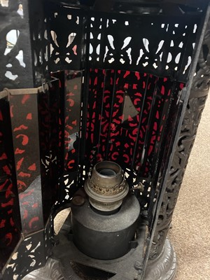Lot 84 - A Victorian cast metal cathedral heater.