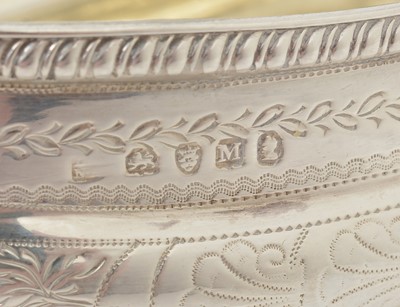 Lot 26 - A George III silver four-piece tea service.