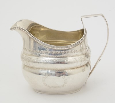 Lot 26 - A George III silver four-piece tea service.