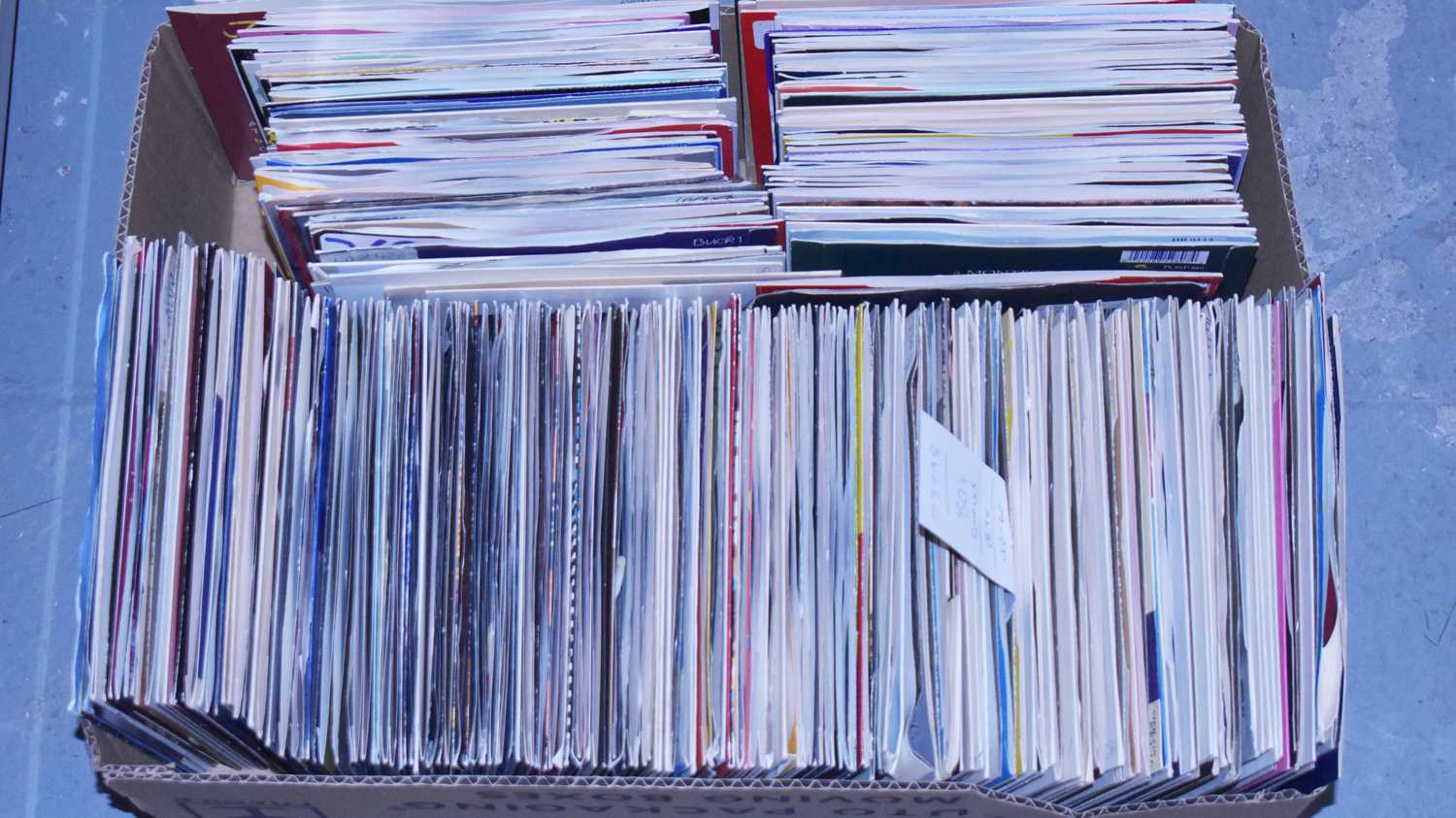 Lot 155 - Box of 7" singles from the 1980s