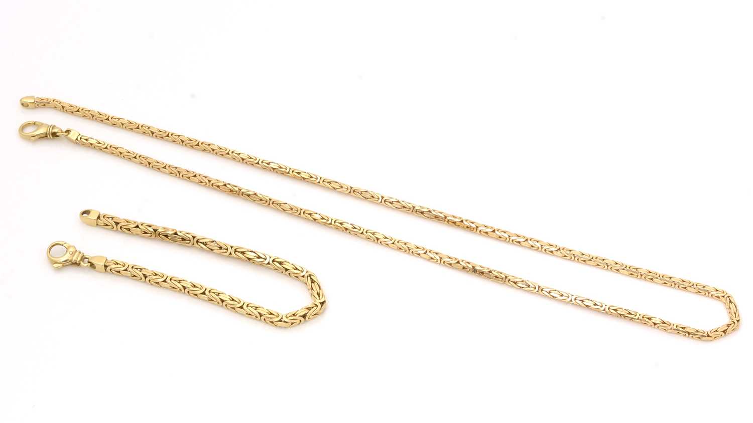 Lot 519 - An 18ct yellow gold matching necklace and bracelet