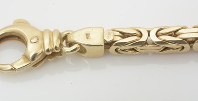 Lot 519 - An 18ct yellow gold matching necklace and bracelet