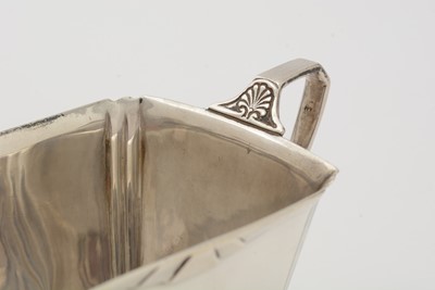 Lot 11 - An art deco three-piece silver tea set