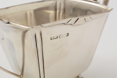Lot 11 - An art deco three-piece silver tea set