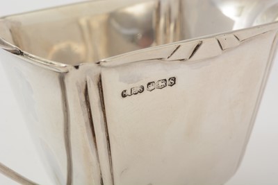Lot 11 - An art deco three-piece silver tea set