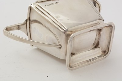 Lot 11 - An art deco three-piece silver tea set