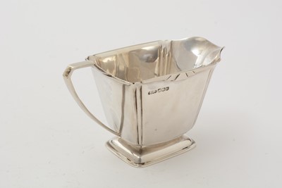 Lot 11 - An art deco three-piece silver tea set