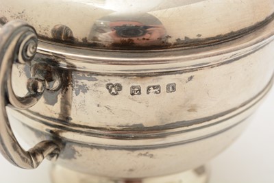 Lot 70 - A matched pair of Edwardian George V silver two handled cups