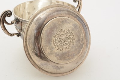 Lot 70 - A matched pair of Edwardian George V silver two handled cups