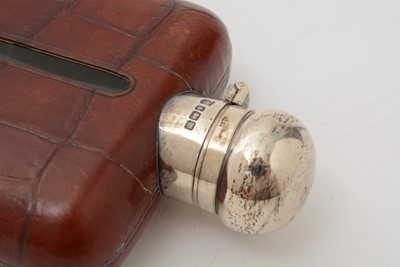 Lot 50 - A George VI silver mounted glass spirit flask