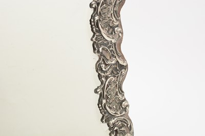 Lot 90 - An Edwardian silver mounted dressing table mirror