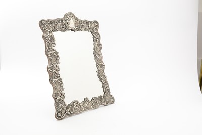 Lot 90 - An Edwardian silver mounted dressing table mirror