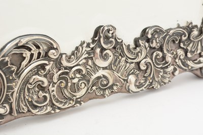 Lot 90 - An Edwardian silver mounted dressing table mirror