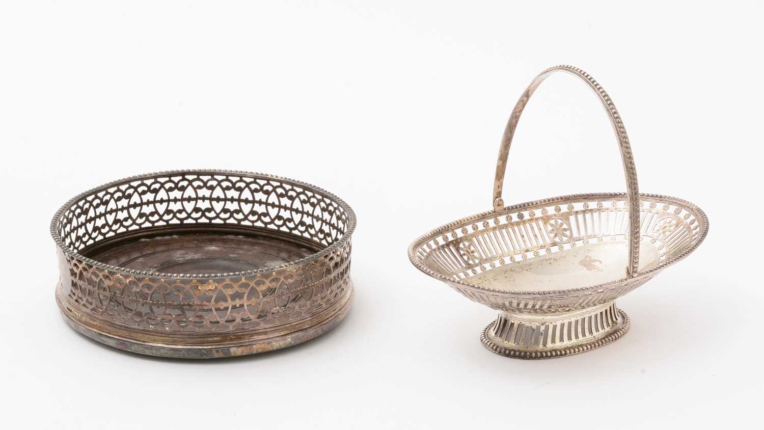 Lot 33 - A George III silver wine coaster
