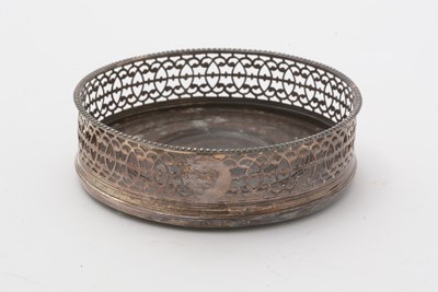 Lot 33 - A George III silver wine coaster