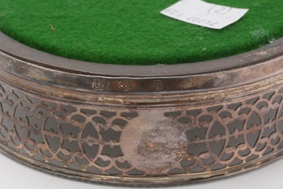 Lot 33 - A George III silver wine coaster