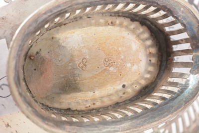 Lot 33 - A George III silver wine coaster