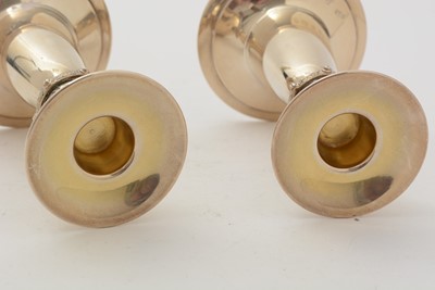 Lot 15 - A pair of Elizabeth II dwarf candlesticks
