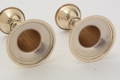Lot 15 - A pair of Elizabeth II dwarf candlesticks