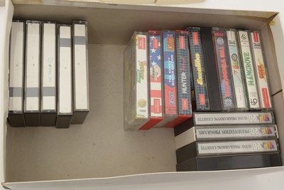 Lot 271 - A Commodore 64 home computer, with a cassette player and a selection of cassette games.