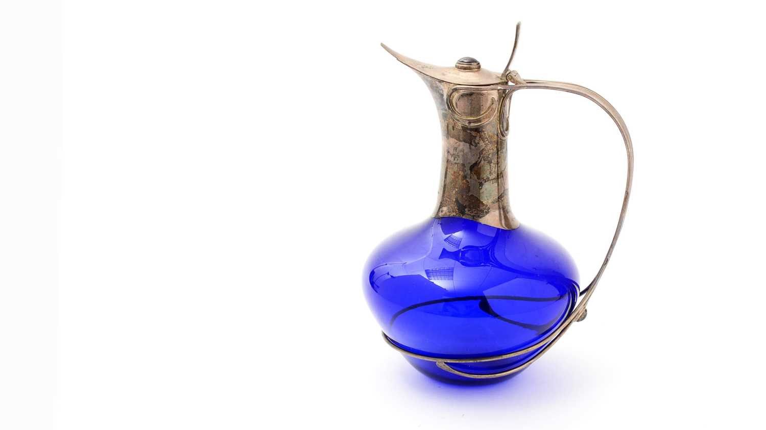 Lot 23 - A contemporary silver-mounted blue glass claret jug