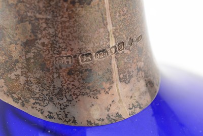 Lot 23 - A contemporary silver-mounted blue glass claret jug
