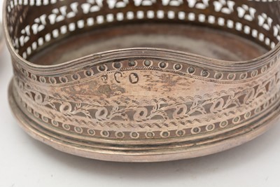 Lot 93 - George III Irish silver wine coaster; and an Edwardian silver wine coaster
