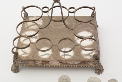 Lot 95 - A George III silver cruet frame; and other items