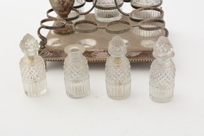 Lot 95 - A George III silver cruet frame; and other items