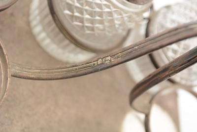 Lot 95 - A George III silver cruet frame; and other items