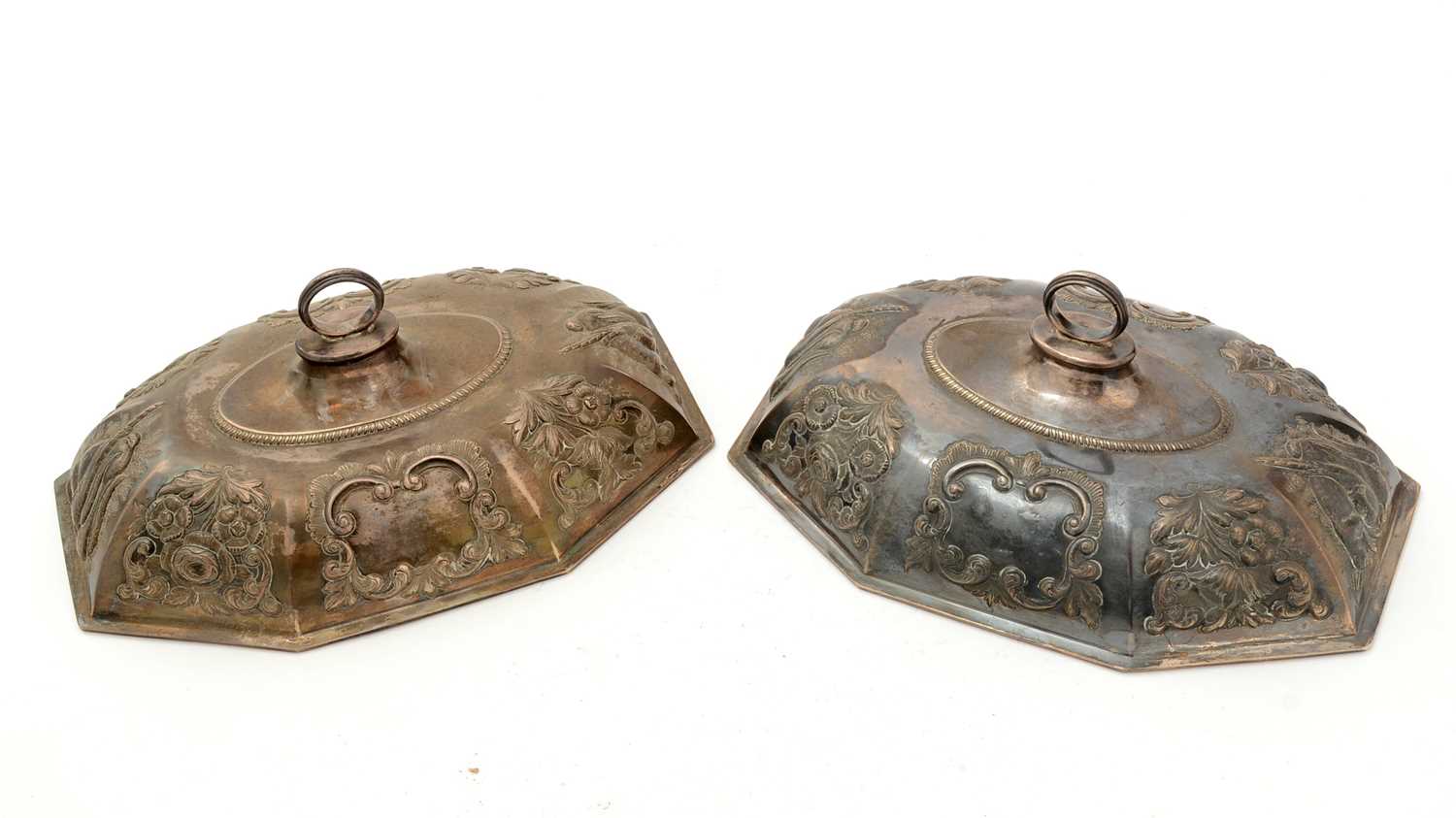 Lot 98 - A pair of George III silver entree dish covers