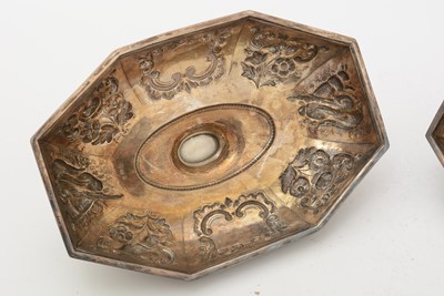 Lot 98 - A pair of George III silver entree dish covers
