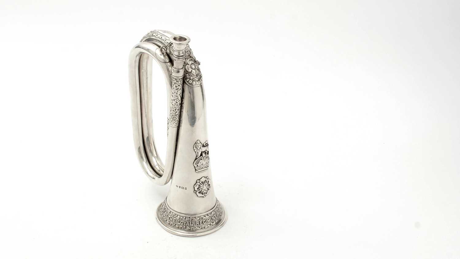 Lot 20 - A George V regimental silver bugle