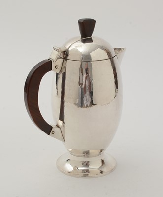 Lot 5 - An Elizabeth II silver handmade coffee pot