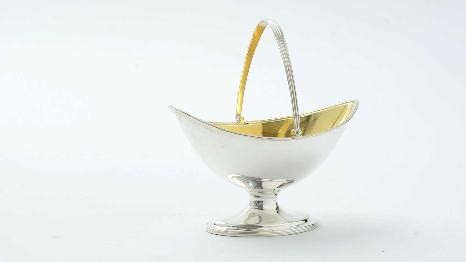 Lot 29 - A George III silver sugar basket