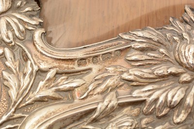 Lot 62 - An Edwardian silver mounted wooden photograph frame