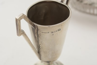 Lot 40 - A late 19th Century American silver square salver; and other items